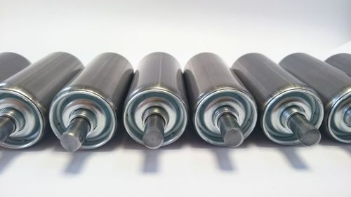 Slip-on conveyor roller - TRG - Matrex - driven / rubber / steel