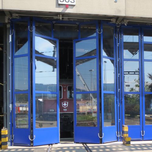 Folding door - ST602F Strong - Schneider Torsysteme Gesellschaft m.b.H - steel / glass / glazed