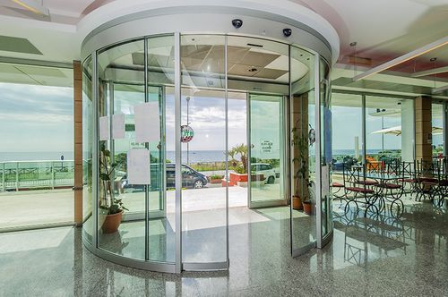 Curved sliding door - Arch - Ponzi - glass / indoor / exterior
