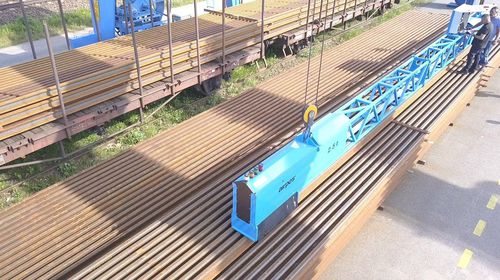 Single-girder lifting beam - Airpes - industrial / for rails / horizontal