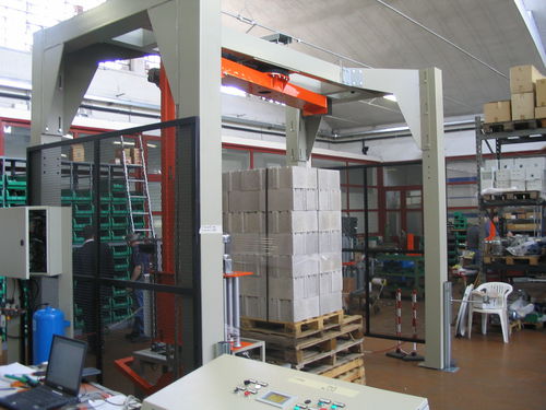 Rotary arm stretch wrapping machine - AV1620 - OFFICINA MECCANICA SESTESE S.p.A. - bag / for building materials / for plastic bottles