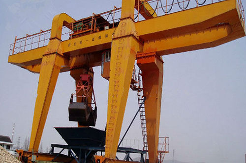Rail-mounted gantry crane - Henan Kuangshan Crane Co., Ltd. - welding / for grab / overhead