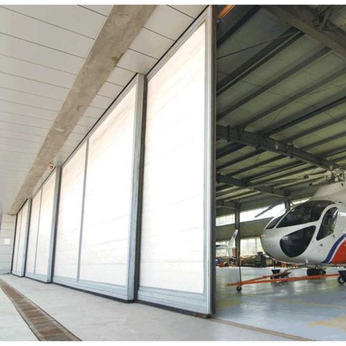 Hangar door - YUOU (LUOYANG) DOORS AND WINDOWS TECHNOLOGY CO., LTD. - sliding / steel / galvanised steel