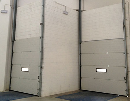 Sectional door - Moreschi Chiusure Industriali S.r.l. - steel / galvanised steel / indoor