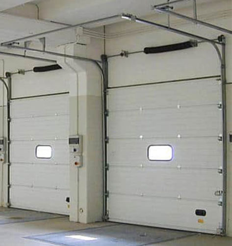 Vertical sliding door - Campisa - lifting / sectional / hinged