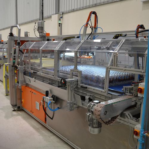 Horizontal bagging machine - Productive Systems - automatic / for the food industry / for bottles