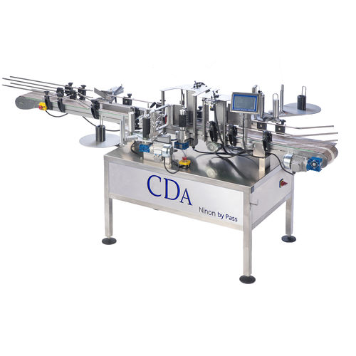 Automatic labeler - Ninon By Pass - CDA - for chemicals / for bottles / side