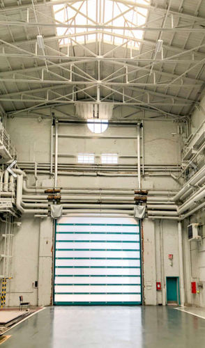 Sectional door - SUNLINE 44 - Jansen Tore GmbH & Co.KG - polycarbonate / industrial / hangar