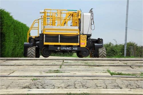 Self-propelled telescopic boom lift - X6  - UNAC - diesel / all-terrain / road-rail