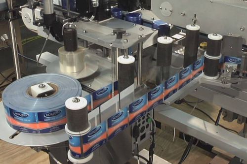 Automatic labeling system - Cozzoli Machine Company