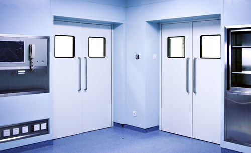 Swing door - PUERTAS FERROFLEX SL - hinged / multi-leaf / stainless steel