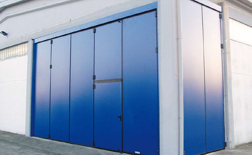 Folding door - Adone - Breda Sistemi Industriali S.p.A. - hangar / industrial