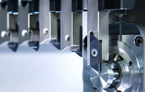 Indexable insert grooving tool - System 208 - GÜHRING - with reversible inserts / Swiss type lathe / with internal coolant