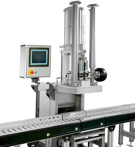 Solids filling machine - Aasted - vibratory weighing