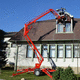 trailer-mounted articulated boom lift / wheeled / electro-hydraulic / indoor/outdoor