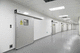 sliding door / glazed / stainless steel / lead-lined