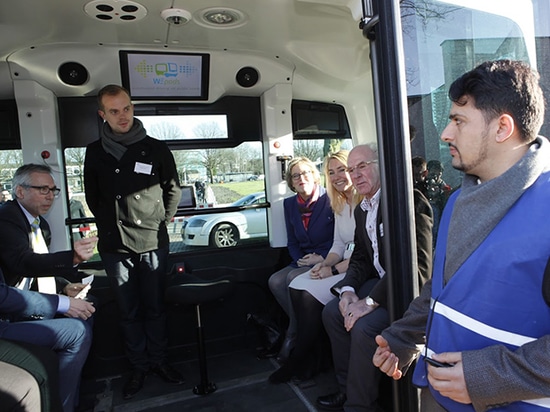 Passengers inside a driverless WEpod shuttle bus.