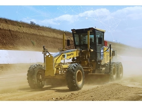 The TG63 (installed on the grader), a high-accuracy automatic GNSS/INS grade control system