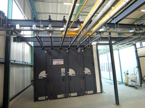 Overhead conveyor for OCA paint line