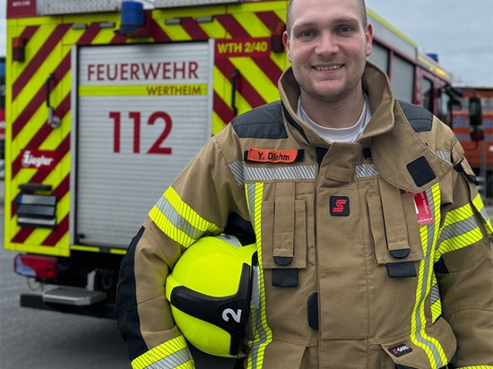 Employee Yannic Diehms volunteering with the fire brigade