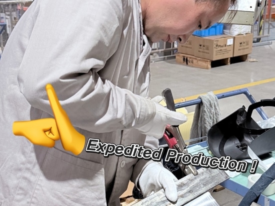 Workers Race Against Time to Boost Production