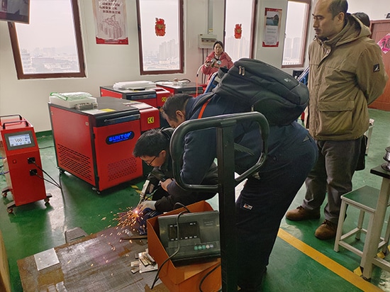 Customer Visits SUNTOP Facility for Laser Welding Machine Demonstration and Hands-On Experience