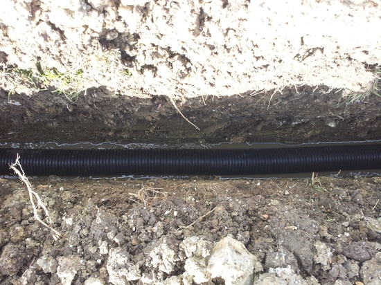 Drainage pipe in a clean cut trench