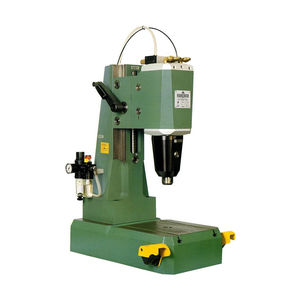 空圧式プレス機