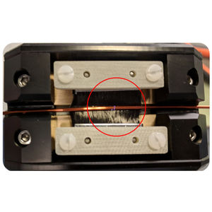 電線絶縁用多孔性検知器