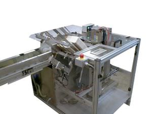 縦型箱詰め機