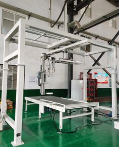 回転アーム式包装機