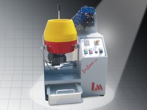 遠心力仕上げ機