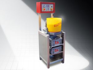 遠心仕上げ機