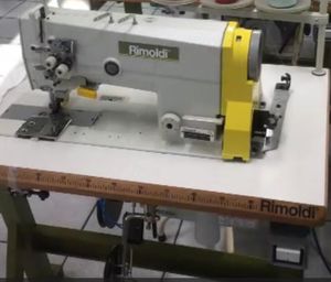 máquina de costura de ponto fixo