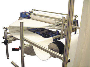 máquina de corte longitudinal para tecidos de malha aberta