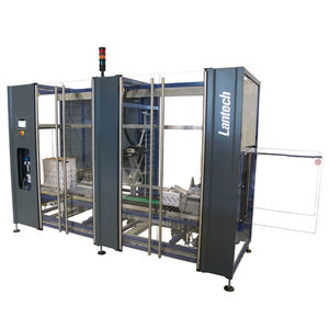 Máquina fechadora de caixas de duas abas