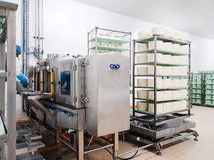 máquina de furar queijo