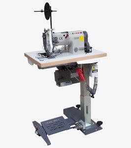máquina de costura de ponto fixo
