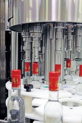Tampadora de pressão - DELLA TOFFOLA GROUP - automática / para garrafas / para a indústria das bebidas