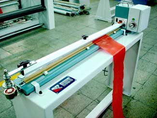 Seladora automática - SEAL-TA - RIUS-COMATEX - de filme plástico / com alimentador / de corte
