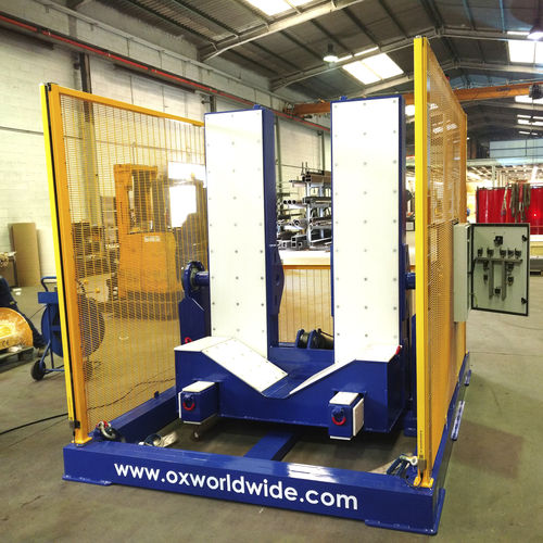 Virador-basculador de carga - TD Series - Ox Worldwide - de tambores / de posicionamento / elétrico