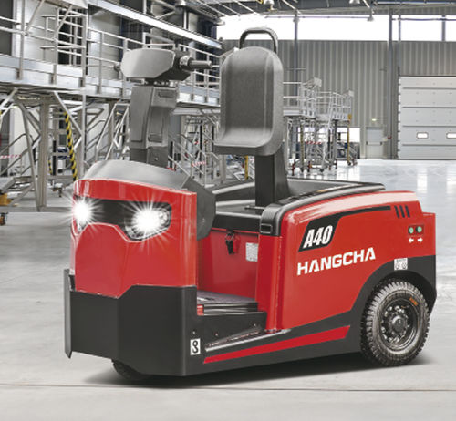 Trator elétrico - QDD C series - HANGCHA FRANCE - de 3 rodas / para operador a bordo em pé / rebocador