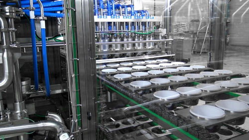 Envasadora-seladora automática - RM90C - SYNERLINK - de copos / de potes / para laticínios
