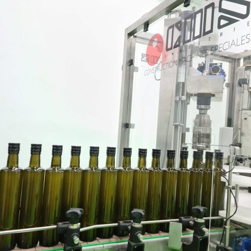 Tampadora linear - CMS industrie - totalmente automática / para azeite / para garrafas