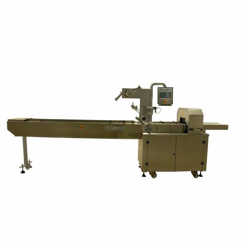 Máquina embaladora controlada por CLP - UM 1200 - Uygurlar Makina - horizontal / para indústria da panificação / com transportador contínuo