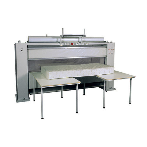 Máquina embaladora semiautomática - SM220 R - DUEFFE - com filme plástico / horizontal / para colchões