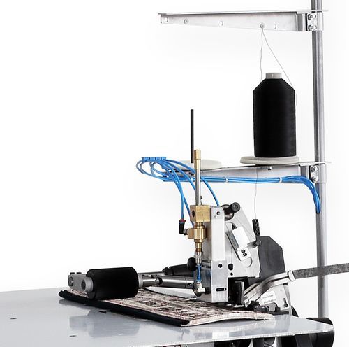 Máquina para orlar carpetes de ponto overlock - TITAN 4510CHX - Vandewiele - de 1 agulha / de um único fio / de alta velocidade