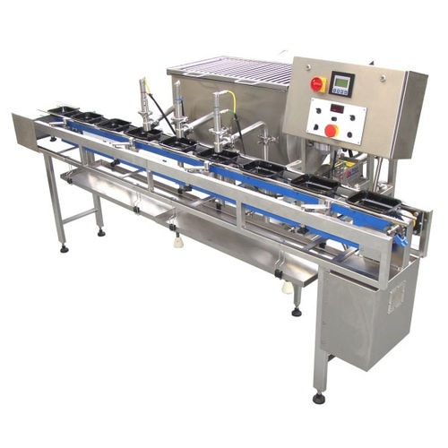 Envasadora automática - Riggs Auto Pack Ltd - de bandejas / para produtos alimentares / de líquidos