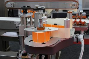 Rotuladora automática - Hermis, JSC - semiautomática / para garrafas / para a indústria de alimentos e bebidas