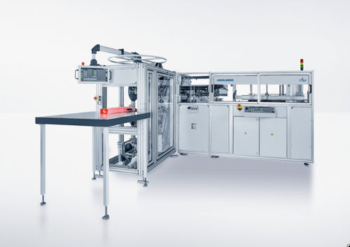 Máquina de corte com faca - LabelSystem DCC-12 - POLAR Cutting Technologies GmbH - com saca-bocados / para papel / de etiquetas